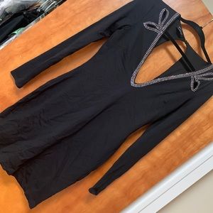 Bebe long sleeve low cut and back open mini dress liek new worn once